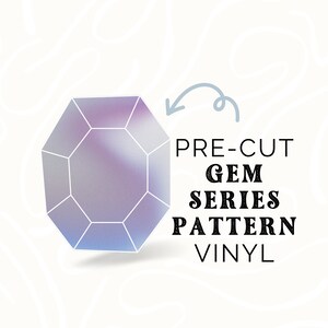 May include: A pre-cut gem series pattern vinyl in the shape of a purple and blue iridescent gemstone. The text "PRE-CUT GEM SERIES PATTERN VINYL" is written below the gemstone.