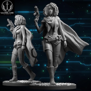 May include: Two gray resin figurines of a woman in futuristic attire, holding a blaster. She wears a cape, shorts, and boots. The figures stand on circular bases. The Wardlade Studio logo is in the upper left corner.