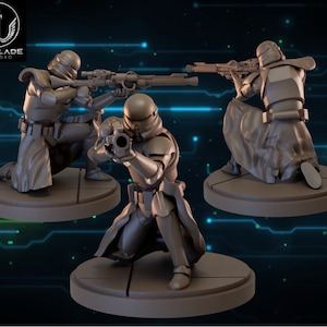 May include: Three grey plastic miniatures of a Star Wars Stormtrooper kneeling and aiming a rifle. The miniatures are on round bases.