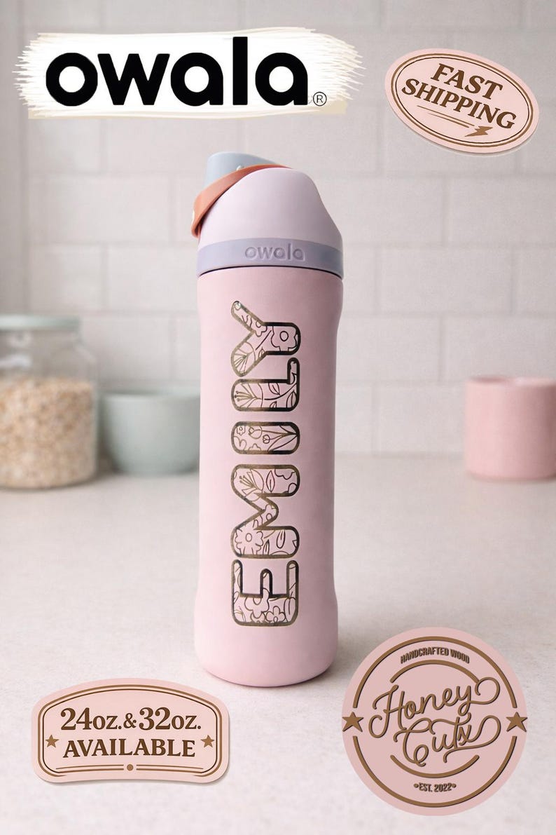 May include: A pink Owala water bottle with the name "EMILY" in a floral design. The bottle has a light pink lid and a handle. The image also includes a "Fast Shipping" sticker and a "Honey Cuts" logo.