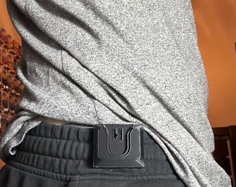 Lightsaber belt clip