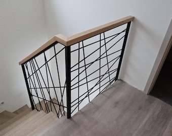 Modern metal staircase railing with a...