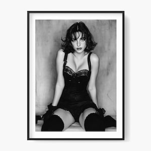 An elegant and sensual boudoir portrait of a woman, a classic black and white photography print. Printable and downloadable.