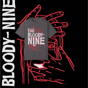 May include: A dark gray t-shirt with red text that reads "They call me THE BLOODY NINE". The text is surrounded by red hand outlines.