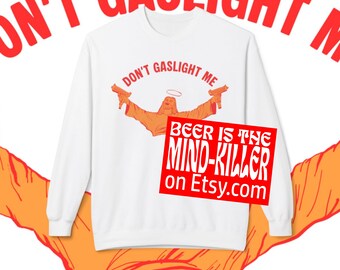 Uzi Jesus、Don't Gaslight Me、Dungeon Crawler Carl Merch、Gildan ユニセックス ミッドウェイト ソフトスタイル フリース クルーネック スウェットシャツ