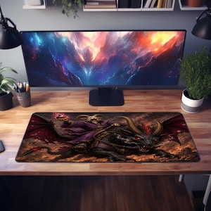 May include: A rectangular desk mat featuring a detailed illustration of a horned, robed figure riding a large, winged, black dragon-like creature with glowing red eyes, set against a dark, fiery background with embers and smoke.