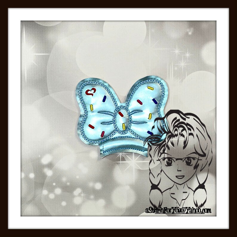 May include: A light blue bow with colorful sprinkles, a heart, and a white outline. The bow is on a white background with a cartoon girl wearing glasses and a braid.