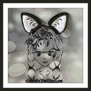 May include: Black and white cat ears headband with a white furry lining. The headband is worn by a cartoon character with glasses and braids. The background is a blurry gray with white circles.