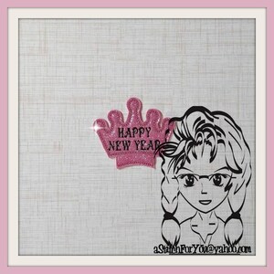 May include: Pink glitter crown with the text "Happy New Year" in black lettering.