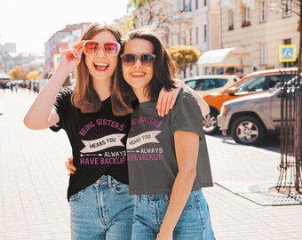 Being a sister Unisex Softstyle T-Shirt