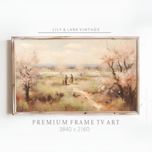 Puede incluir: Una pintura vintage en un marco blanco representa un paisaje con un camino de tierra que conduce a través de un campo de árboles con flores rosadas. Tres figuras caminan por el camino. La pintura se titula "Premium Frame TV Art 3840 x 2160".