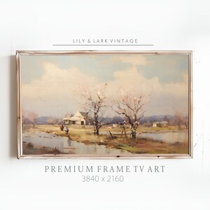 Puede incluir: Una pintura vintage de un paisaje rural con una granja, árboles y un arroyo. La pintura está enmarcada en un marco de madera blanco. El texto "PREMIUM FRAME TV ART 3840 x 2160" está impreso debajo del marco.