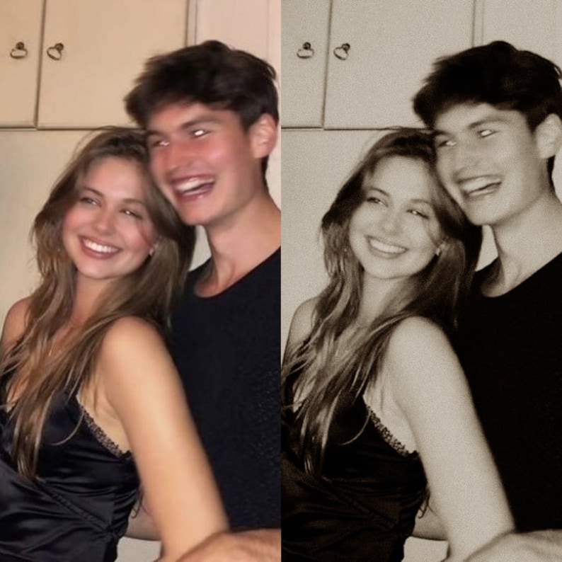 May include: A sepia-toned photograph of a smiling couple. The woman wears a black satin camisole with lace trim and has long, wavy hair. The man, in a black shirt, smiles broadly, his arm around her. They are indoors.