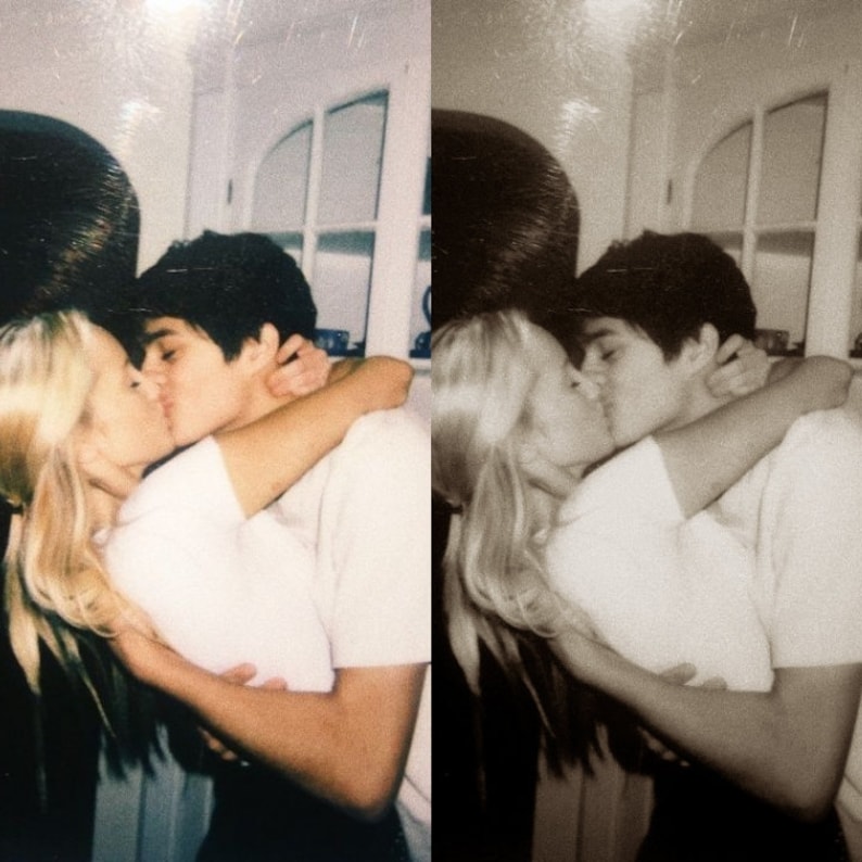 May include: A vintage-style photograph shows a couple embracing and kissing. The woman has long blonde hair, and the man has dark hair. Both are wearing white t-shirts. The image is in black and white.