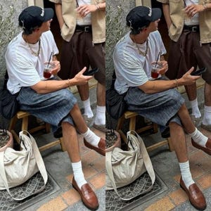 May include: Two people wearing white t-shirts, black baseball caps, and blue and white striped shorts are sitting on wooden stools. They are both holding a cup of iced coffee and a phone. They are wearing white socks and brown leather loafers.