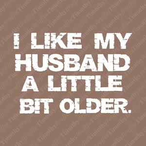 May include: A brown graphic design featuring the white distressed-style text I LIKE MY HUSBAND A LITTLE BIT OLDER. The background is a solid brown color with a repeating watermark pattern of the name Timothy Bruffin in a lighter brown shade.