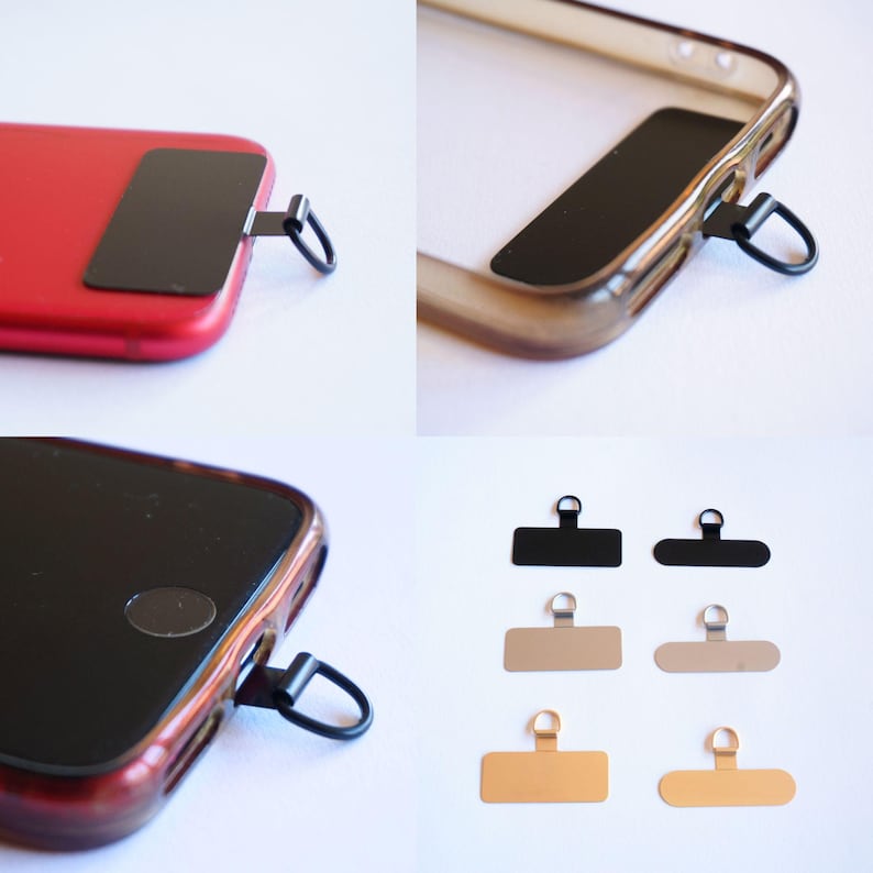 May include: A close-up of a black phone case with a clear back and a black metal ring attached to the back. The ring is designed to be used as a phone grip or stand. The case is shown on a white background.