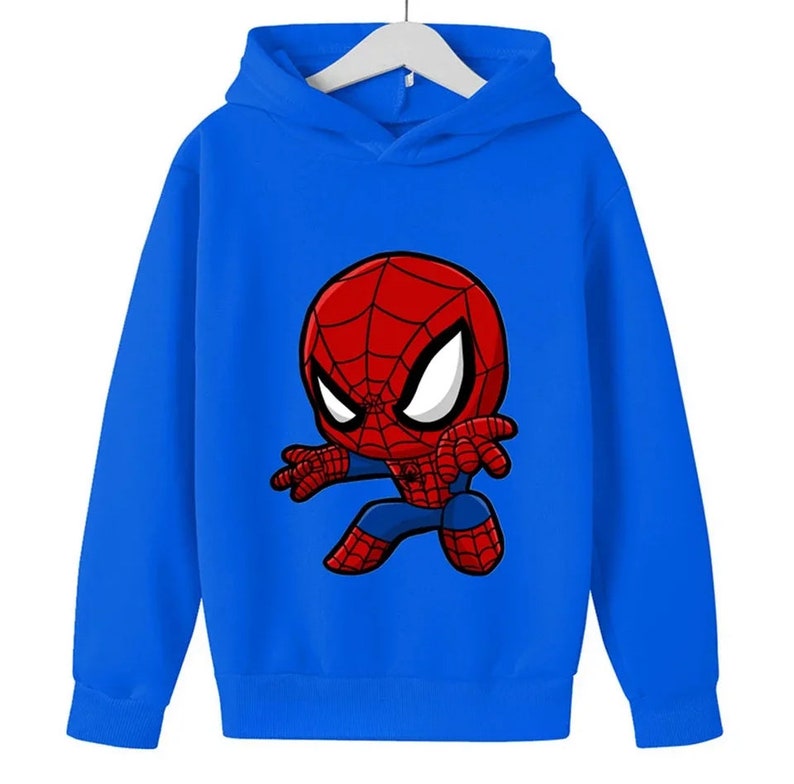 May include: A blue hooded sweatshirt featuring a cartoon image of Spiderman in a red and black suit.