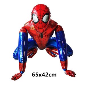 May include: A large, red and blue Spider-Man balloon in a crouching pose. The balloon features the character's iconic mask with white eye shapes and a black spider emblem on the chest. The balloon measures 65cm x 42cm.