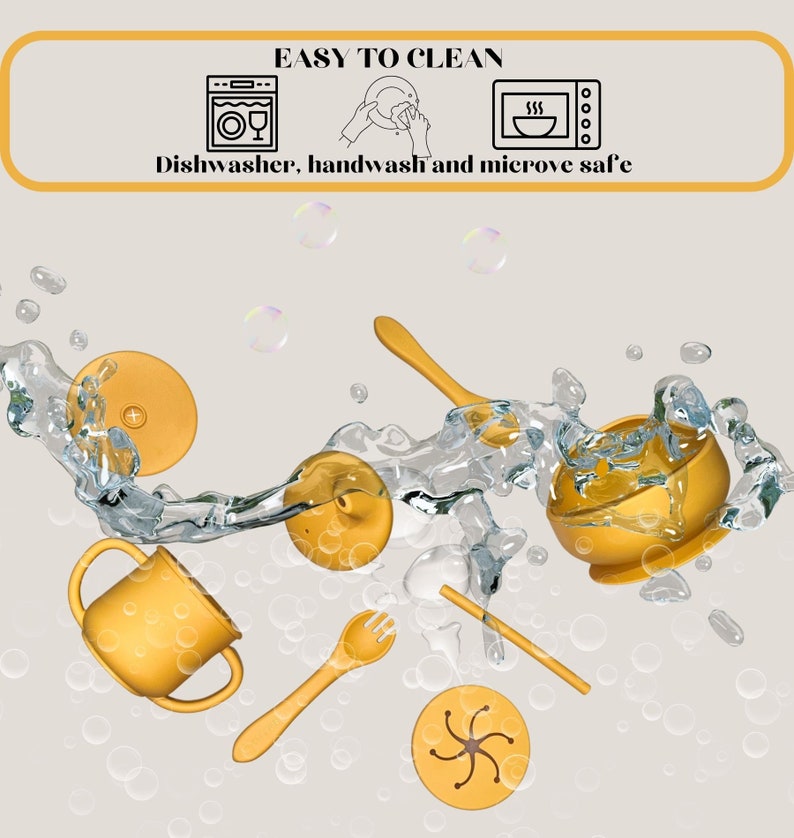 May include: A set of yellow silicone baby feeding utensils, including a bowl, a cup, a spoon, a fork, and a suction plate. The utensils are floating in water, suggesting they are easy to clean. The text "Easy to Clean" and "Dishwasher, handwash and microwave safe" is displayed above the utensils.