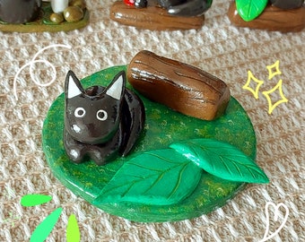 Black cat figurine