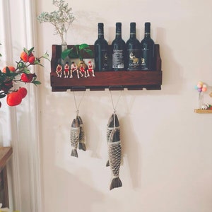 Decoración colgante estilo pez de madera