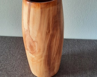 Turned wooden vase, sealed with barrel pitch