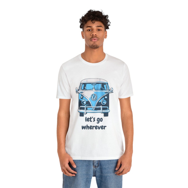 May include: White t-shirt with a blue and white illustration of a vintage Volkswagen van. The text "Let's go wherever" is printed below the van.