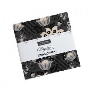 May include: A stack of fabric squares with a floral pattern in shades of grey and cream. The fabric is wrapped with a white band that reads "Boudoir" and "BASICGREY". A ruler is printed on the band.
