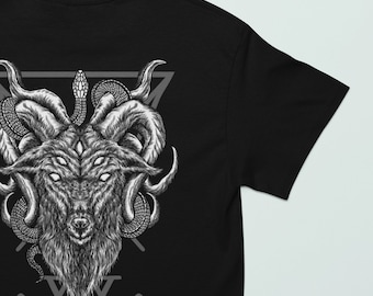 May include: Black t-shirt with a white graphic print of a goat's head with a snake wrapped around its horns. The goat's head is inside a triangle with a symbol below it.