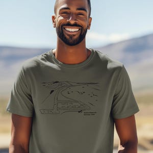 Camiseta para hombre Wild Kindness Northumberland, Parque Nacional del Reino Unido, confeccionada en algodón orgánico