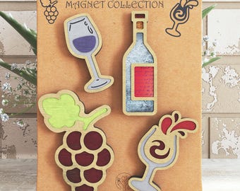May include: Wooden magnet collection with wine-themed designs. Includes a wine bottle, wine glasses, and grapes. The text "MAGNET COLLECTION" and "HAND MADE" are visible. Digital download available.