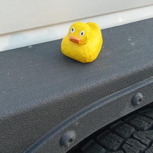 Hand-Carved Wooden Jeep Duck: Rustic Alder Wood Carving