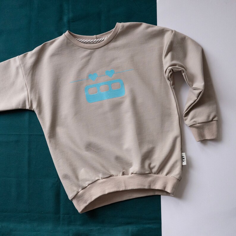 Sweater Herzibahn / aus BioSweat für Kinder / Sofortkauf Gr.128 beige/blau