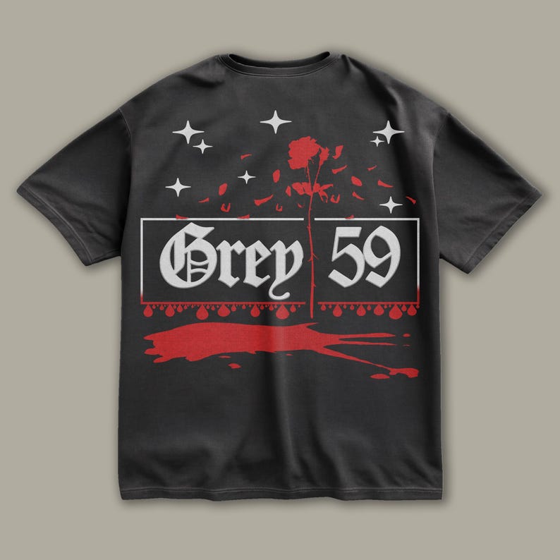 May include: Black t-shirt with a white graphic design of a rose with petals falling, a white banner with the text "Grey 59" and white stars. The graphic is surrounded by red dripping paint.
