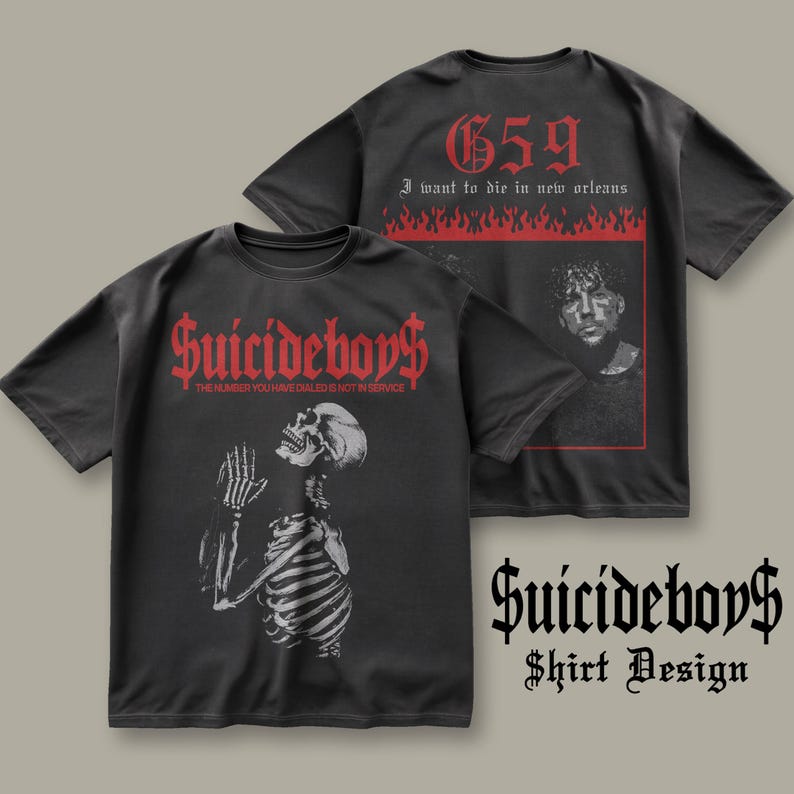 May include: Two black t-shirts with a graphic design featuring a skeleton and the text "Suicideboy$ THE NUMBER YOU HAVE DIALED IS NOT IN SERVICE". The back of one shirt has the text "659 I want to die in new orleans" with flames.