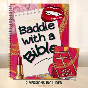 May include: A spiral-bound notebook with the text "Baddie with a Bible" on a cream-colored page. The background is a vibrant mix of pink and orange. A smaller red notebook with "Holy Bible" is also visible, along with a lipstick and a pair of red lips.