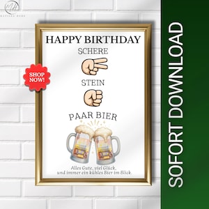 Puede incluir: Una impresión enmarcada con borde dorado presenta las palabras "Happy Birthday" y texto en alemán. La imagen incluye ilustraciones de gestos con las manos y jarras de cerveza. Una pegatina roja "Shop Now!" está a la izquierda.