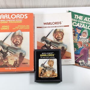 Warlords CIB - Complete in Box for Atari 2600 - Game, Manual, Catalog & Box with Protective Case - Paddle Controller Required Combined Ship