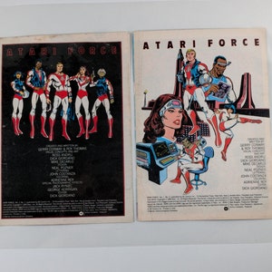 May include: A comic book cover for Atari Force #1. The cover features a group of superheroes in red, white, and blue costumes. The text "ATARI FORCE" is printed in large, bold letters at the top of the cover.