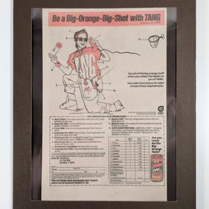 May include: A vintage Tang orange drink advertisement featuring a cartoon character with an orange outfit and a basketball. The ad encourages you to "Be a Big-Orange-Big-Shot with TANG" and includes a certificate for a free sample of Tang.