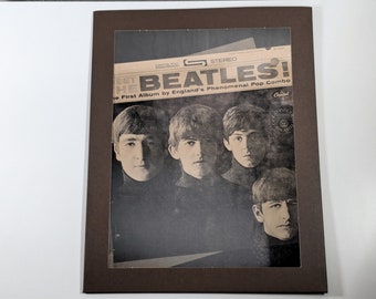 Framed Laminated Meet The Beatles Album Cover Cutout - Classic Newspaper Ad, Four Beatles in Black Turtlenecks