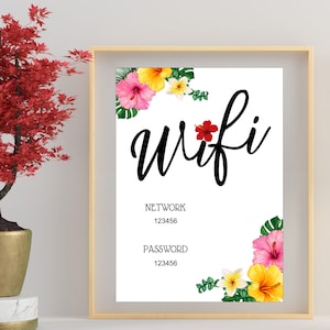 May include: A printable sign with a tropical floral border and the word "wifi" in black cursive lettering. The sign includes the text "NETWORK 123456" and "PASSWORD 123456".