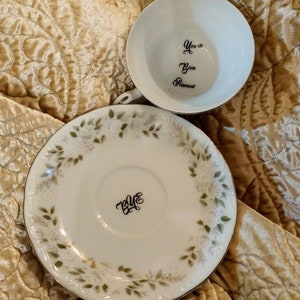 You&#39;ve been poisoned bye tea cup and saucer altered china teacup gift custom white pastel rose  poison cup message at bottom calligraphy