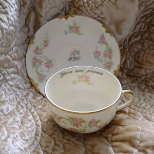 You&#39;ve been poisoned bye tea cup and saucer altered china pink & gold teacup gift custom personalized present floral Murderino calligraphy