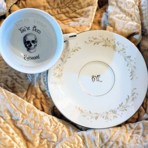 You've been poisoned bye tea cup and saucer altered china teacup gift custom skull rose personalized poison cup message at bottom Murderino