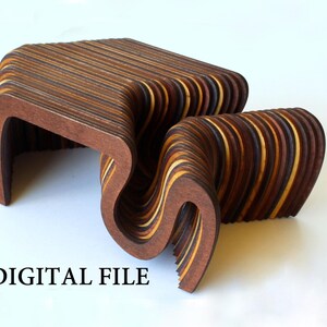 May include: A layered wooden structure featuring a series of curved, undulating panels in shades of dark brown, medium brown, and light tan. The object has a fluid, wave-like form with visible stacked edges. The text DIGITAL FILE is printed below.
