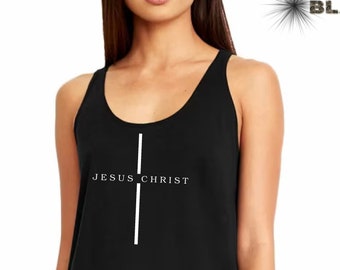 May include: Black tank top with a white cross and the text "JESUS CHRIST" printed on the front.