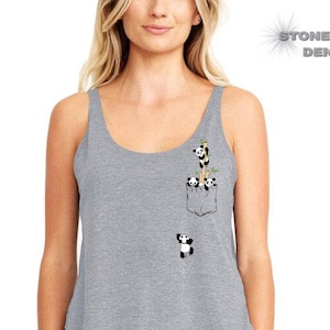 May include: Gray tank top with a pocket featuring a graphic of pandas climbing bamboo. The text "Stonewash Denim" is in the top right corner of the image.