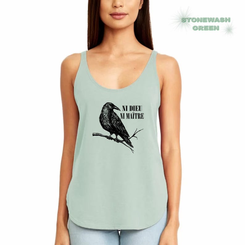 May include: A light green tank top with a black crow illustration and the text "NI DIEU NI MAITRE" printed on the front.